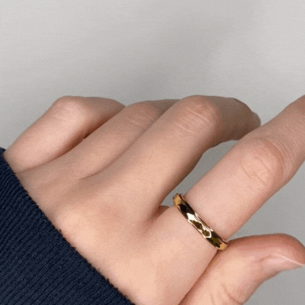 Gold ripple fidget ring