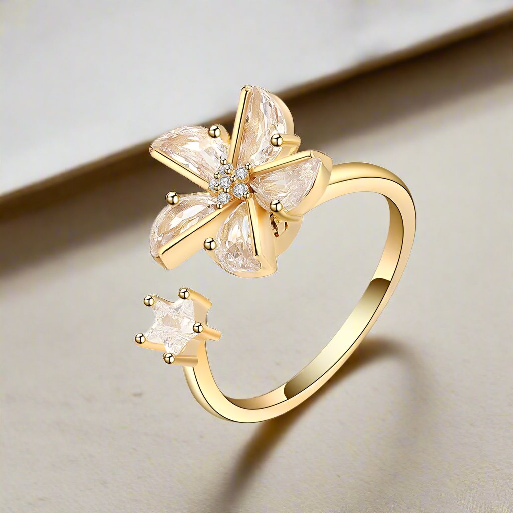 Blush blossom fidget ring in gold