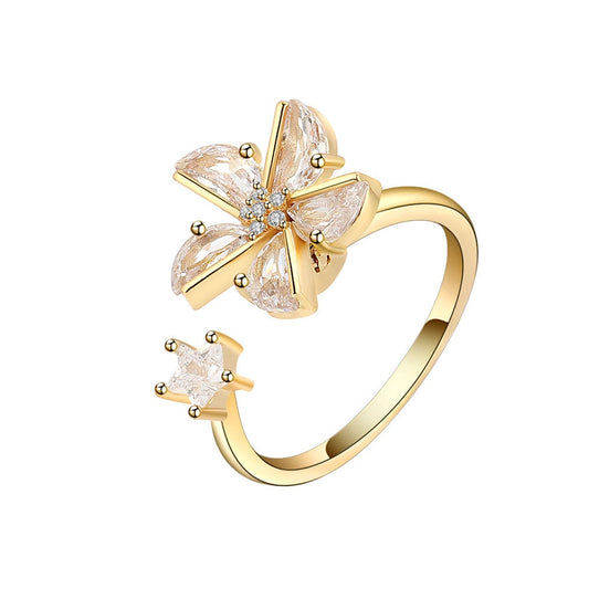 Blush blossom fidget ring in gold